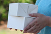 A Picture of product 251-131 Carry-Out Box.  1-Piece, Lunch Fast Top.  8-7/8" x 4-7/8" x 3-1/16".  White Color, 400/Case