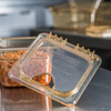 A Picture of product CFS-10519Z13 StorPlus™ High Heat EZ Access Hinged Notched Universal Food Pan Lids, 1/6 Size. 6.88 X 6.31 X 2.00 in. Amber. 6 each/case.