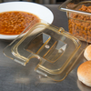 A Picture of product CFS-10511U13 StorPlus™ High Heat Handled Notched Universal Food Pan Lids, 1/6 Size. 6.88 X 6.31 X 0.88 in. Amber. 6 each/case.